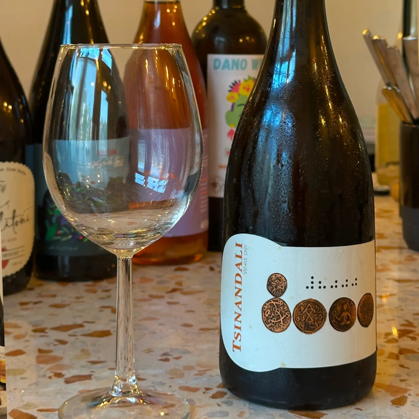 bottle and glass of white wine