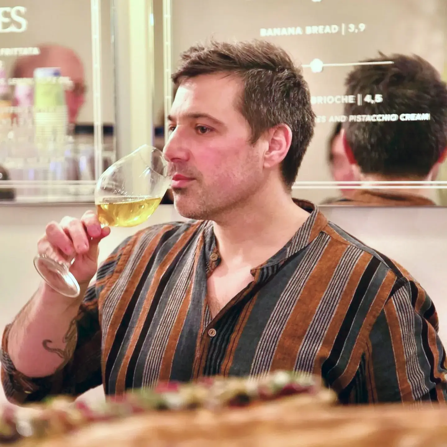 Alex tasting wine